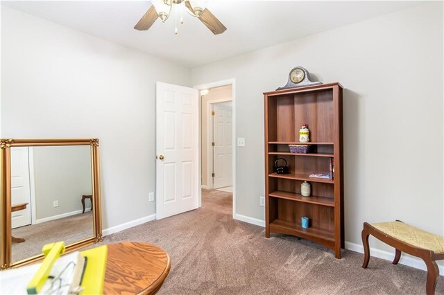 living room featuring a fireplace, beam ceiling, carpet flooring, a healthy amount of sunlight, and high vaulted ceiling