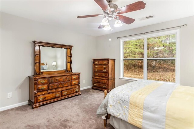 bedroom featuring ceiling fan and carpet flooring