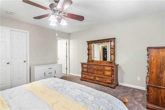 bathroom with toilet, walk in shower, and vanity