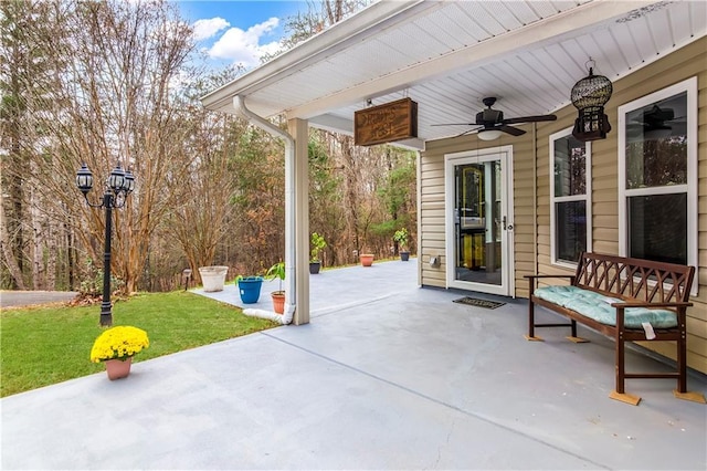 view of patio / terrace featuring ceiling fan