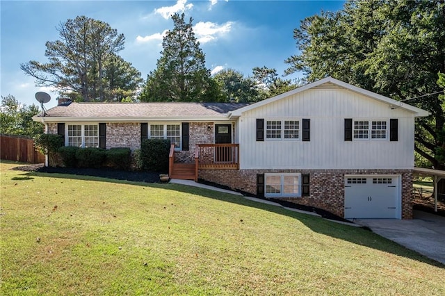 view of front of home featuring a garage and a front yard