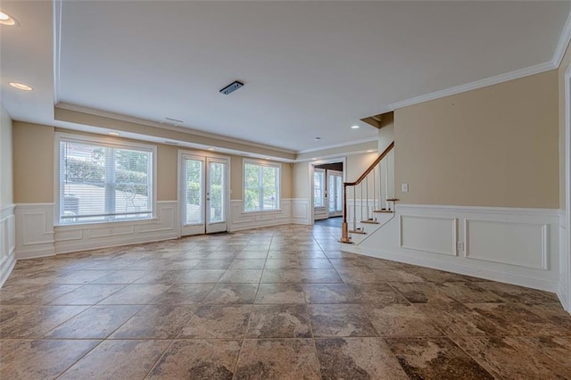 spare room with stairway, ornamental molding, recessed lighting, and wainscoting