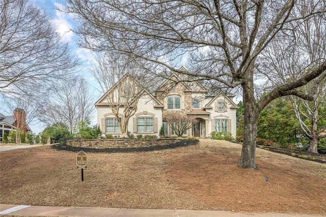 view of front of property featuring stucco siding