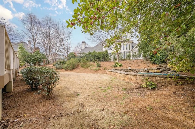 view of yard with fence