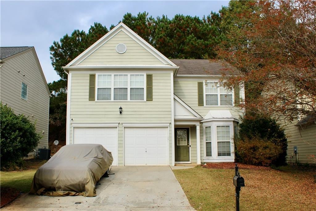 415 Chippenham Ct, Alpharetta, GA 30005 - view of front of property with a garage