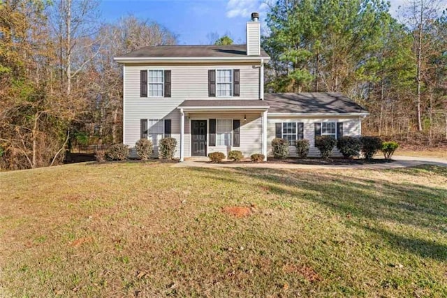 view of front of property featuring a front yard