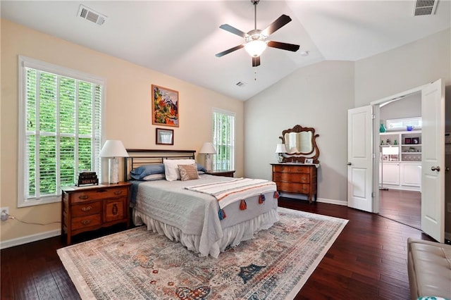 bedroom featuring lofted ceiling, dark hardwood / wood-style floors, and ceiling fan