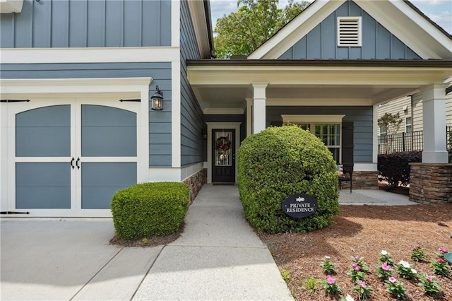 doorway to property featuring a garage