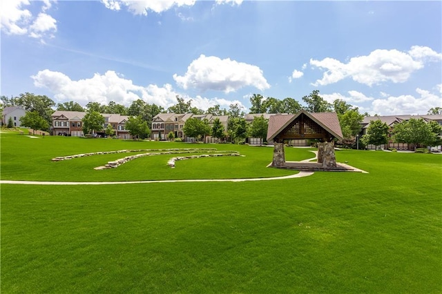 view of community featuring a lawn