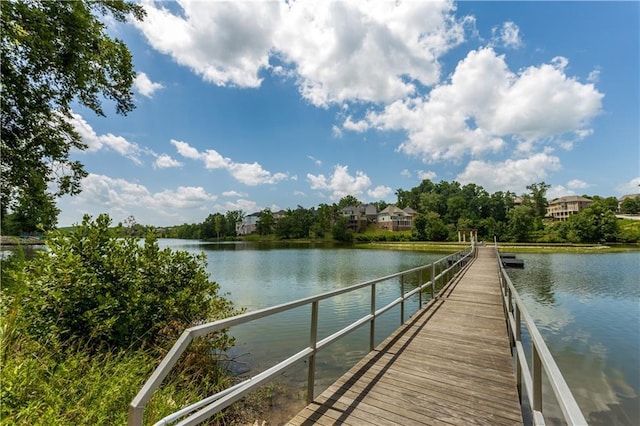 dock area featuring a water view