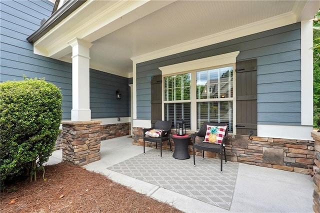 view of patio featuring a porch