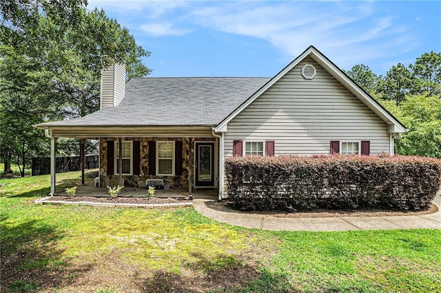 55 Ashland Farm Rd, Oxford, GA 30054 - view of front of property with a chimney, a front yard, stone siding, and a shingled roof