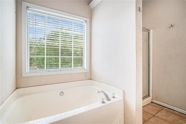 55 Ashland Farm Rd, Oxford, GA 30054 - bathroom featuring a bath, tile patterned floors, and a stall shower
