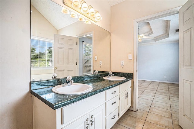 55 Ashland Farm Rd, Oxford, GA 30054 - full bathroom featuring double vanity, a textured ceiling, tile patterned flooring, a ceiling fan, and lofted ceiling