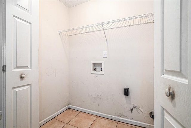 55 Ashland Farm Rd, Oxford, GA 30054 - laundry room with light tile patterned floors and washer hookup