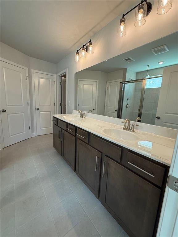 4266 Mulberry Pass Ct, Hoschton, GA 30548 - full bathroom with a shower stall, double vanity, and tile patterned floors