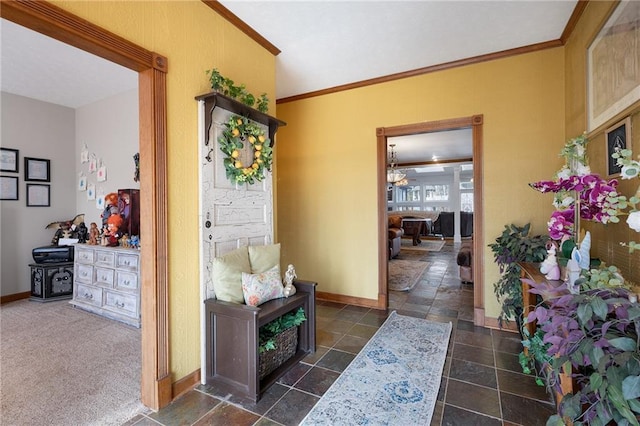 104 Aspen Dr NE, Calhoun, GA 30701 - hall featuring ornamental molding, baseboards, stone tile flooring, and a chandelier