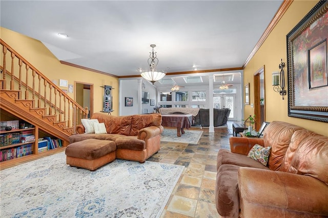 104 Aspen Dr NE, Calhoun, GA 30701 - living room with crown molding, stone tile floors, and stairway