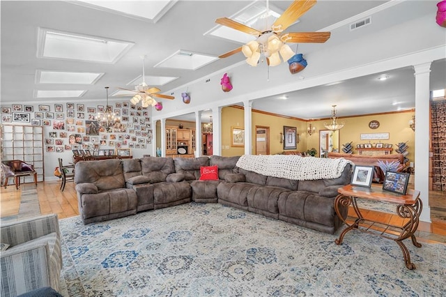 104 Aspen Dr NE, Calhoun, GA 30701 - living area with a ceiling fan, a skylight, ornate columns, ornamental molding, and wood finished floors