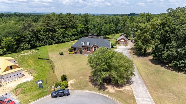 104 Aspen Dr NE, Calhoun, GA 30701 - aerial view of property and surrounding area with a heavily wooded area