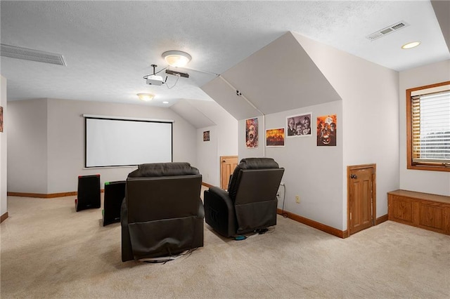 104 Aspen Dr NE, Calhoun, GA 30701 - carpeted cinema room with baseboards, vaulted ceiling, and a textured ceiling
