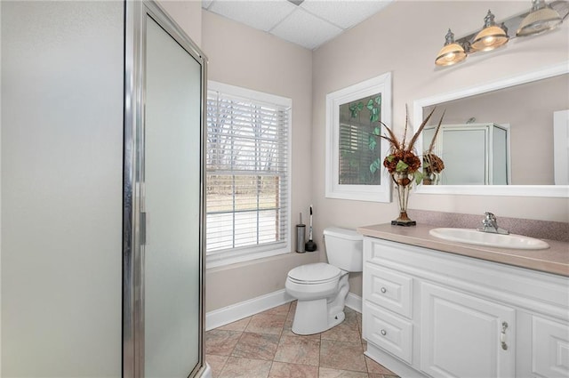 104 Aspen Dr NE, Calhoun, GA 30701 - full bathroom with toilet, vanity, a stall shower, baseboards, and a paneled ceiling