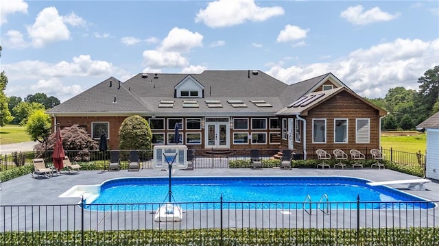 104 Aspen Dr NE, Calhoun, GA 30701 - view of swimming pool featuring a patio area, french doors, and a diving board