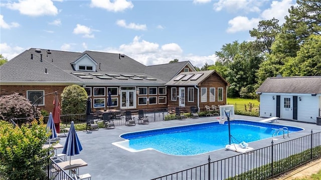 104 Aspen Dr NE, Calhoun, GA 30701 - view of swimming pool with a patio area, an outbuilding, and french doors