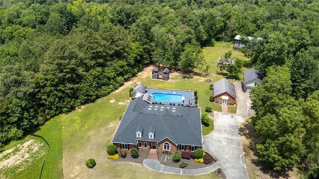 104 Aspen Dr NE, Calhoun, GA 30701 - view from above of property with a heavily wooded area and a pool area