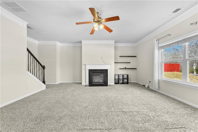 1566 Wilson Manor Cir, Lawrenceville, GA 30045 - unfurnished living room with carpet floors, visible vents, crown molding, and baseboards