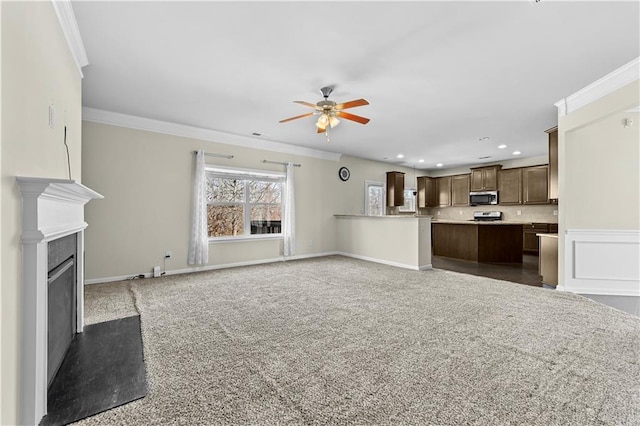 1566 Wilson Manor Cir, Lawrenceville, GA 30045 - unfurnished living room with carpet, ornamental molding, a fireplace, and a ceiling fan