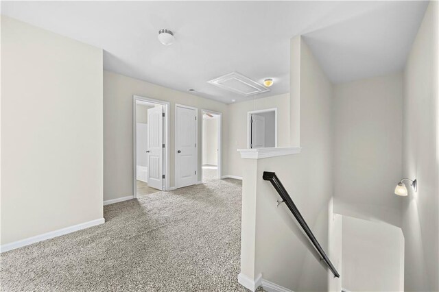 1566 Wilson Manor Cir, Lawrenceville, GA 30045 - hallway with carpet, baseboards, and an upstairs landing