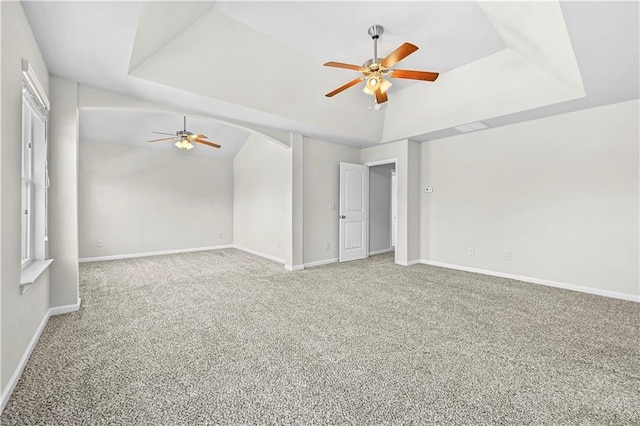 1566 Wilson Manor Cir, Lawrenceville, GA 30045 - empty room with lofted ceiling, a raised ceiling, carpet flooring, and baseboards