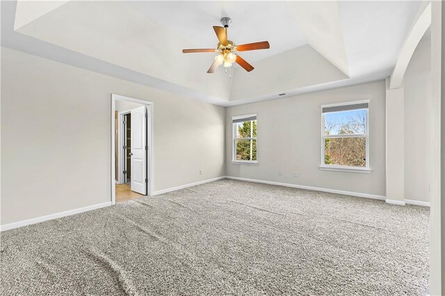 1566 Wilson Manor Cir, Lawrenceville, GA 30045 - unfurnished room featuring a raised ceiling, light carpet, ceiling fan, and baseboards