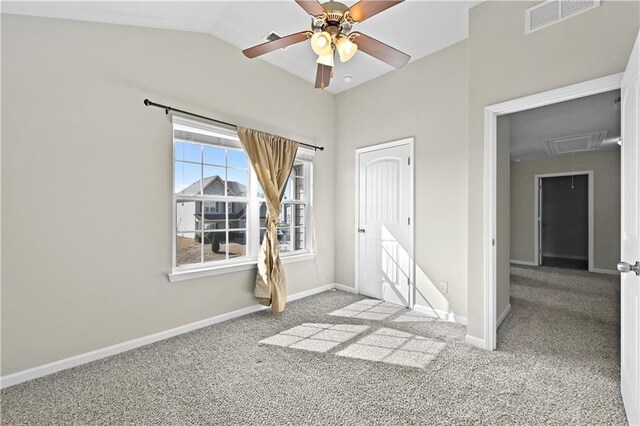 1566 Wilson Manor Cir, Lawrenceville, GA 30045 - carpeted spare room with baseboards, lofted ceiling, visible vents, and attic access
