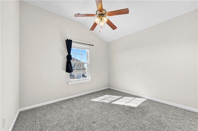 1566 Wilson Manor Cir, Lawrenceville, GA 30045 - unfurnished room with carpet floors, lofted ceiling, baseboards, and a ceiling fan