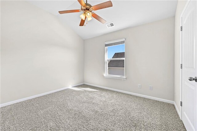1566 Wilson Manor Cir, Lawrenceville, GA 30045 - carpeted empty room featuring lofted ceiling, visible vents, ceiling fan, and baseboards