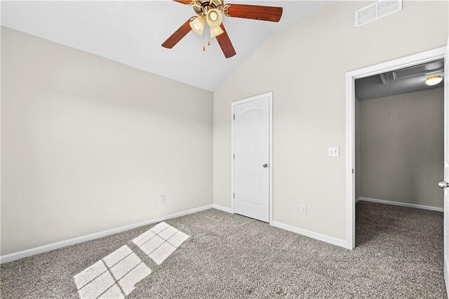 1566 Wilson Manor Cir, Lawrenceville, GA 30045 - unfurnished bedroom with carpet flooring, visible vents, baseboards, vaulted ceiling, and attic access