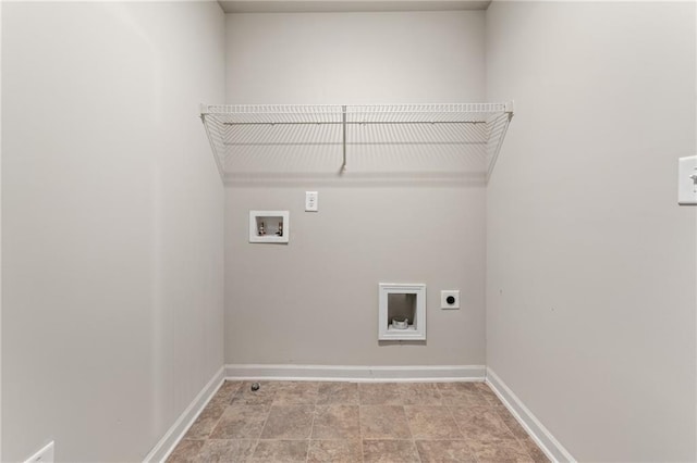 washroom with laundry area, hookup for a washing machine, electric dryer hookup, and baseboards