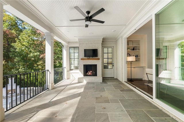 view of patio / terrace featuring ceiling fan