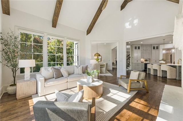 living room featuring beam ceiling, high vaulted ceiling, and dark hardwood / wood-style flooring