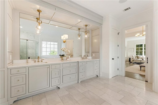 bathroom with vanity, wood-type flooring, a wealth of natural light, and an enclosed shower