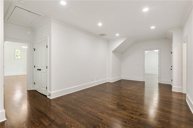 additional living space with dark hardwood / wood-style flooring