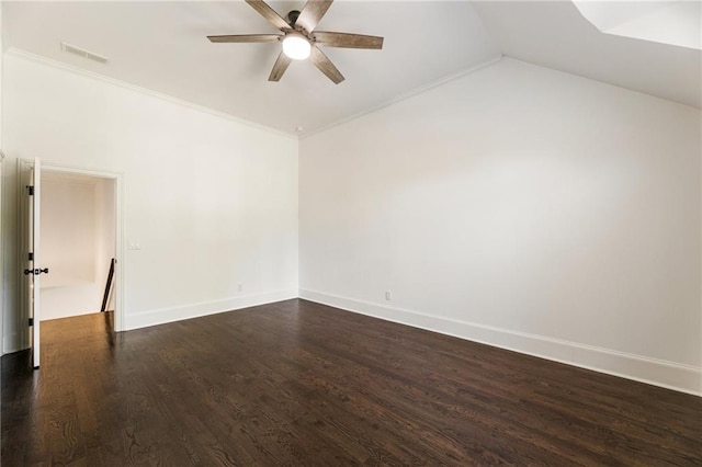 unfurnished room featuring ornamental molding, ceiling fan, dark wood-type flooring, and vaulted ceiling