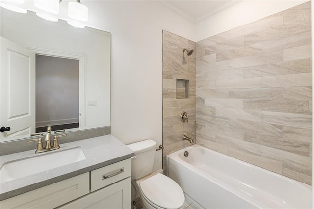 full bathroom with vanity, crown molding, tiled shower / bath combo, and toilet