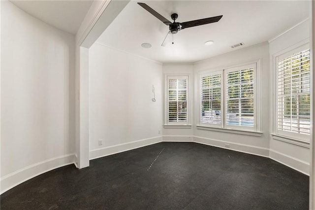 unfurnished room with a wealth of natural light, ornamental molding, and ceiling fan