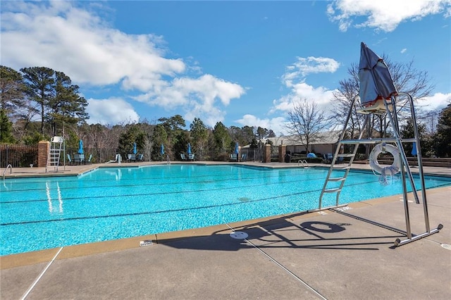 view of swimming pool featuring a water slide