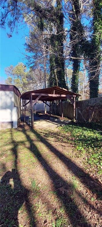 view of yard featuring a carport