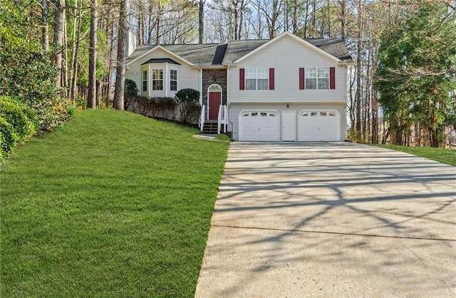 bi-level home featuring a garage, a front lawn, driveway, and entry steps