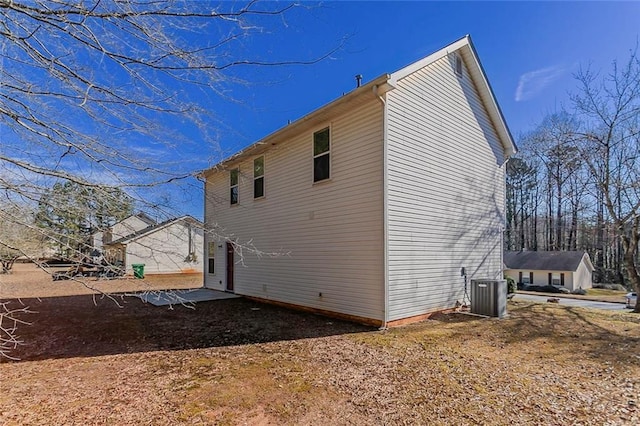 view of property exterior with cooling unit